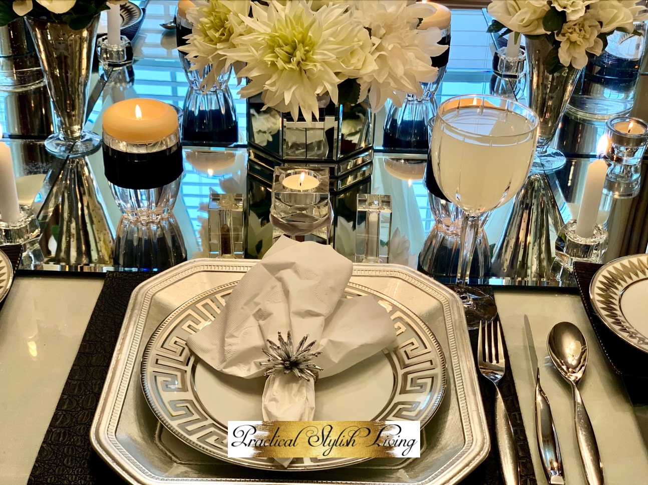 Stylish Table Setting Ideas. White and silver table setting with candle lights