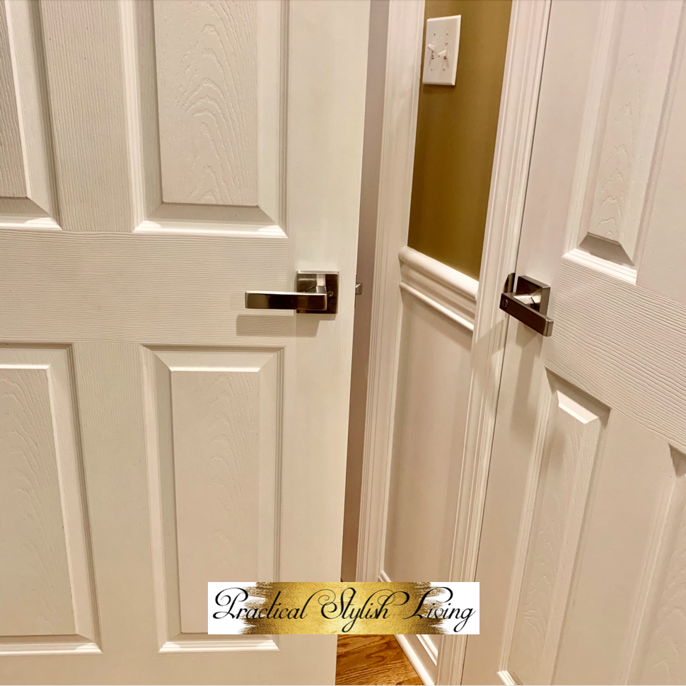Satin nickel interior door knobs with locks.