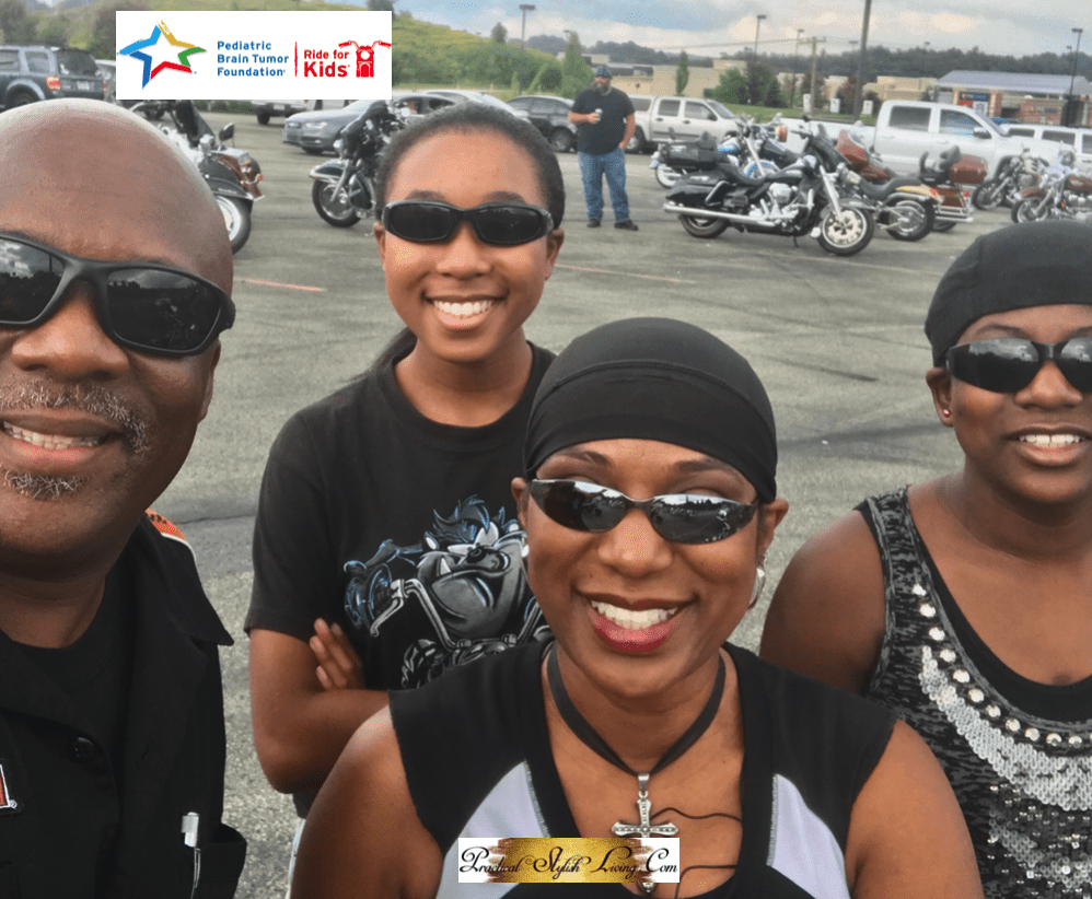 African American father, mother and daughters at Ride for Kids