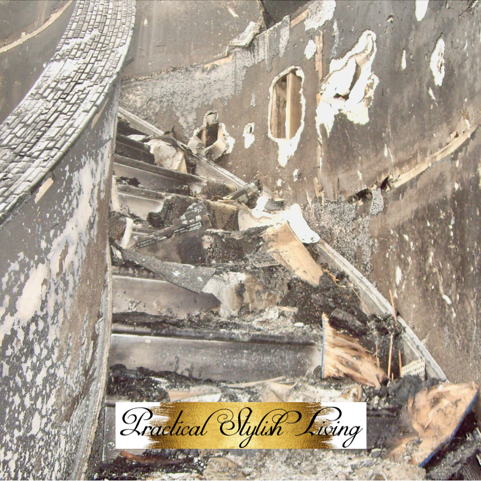 Inside of home view of foyer staircase after a devastating fire.