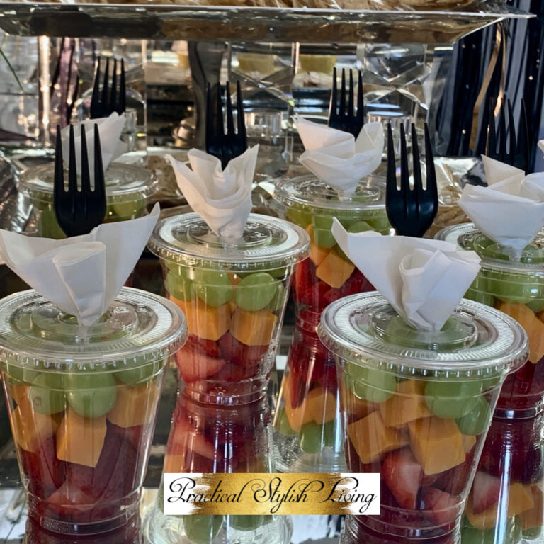 Prepackaged fruit displayed in clear container with a napkin and fork. Rainbow Fruit Cups Fruit Cup Platters Mini Fruit Cups | Practical Stylish Living | Luxe Entertaining