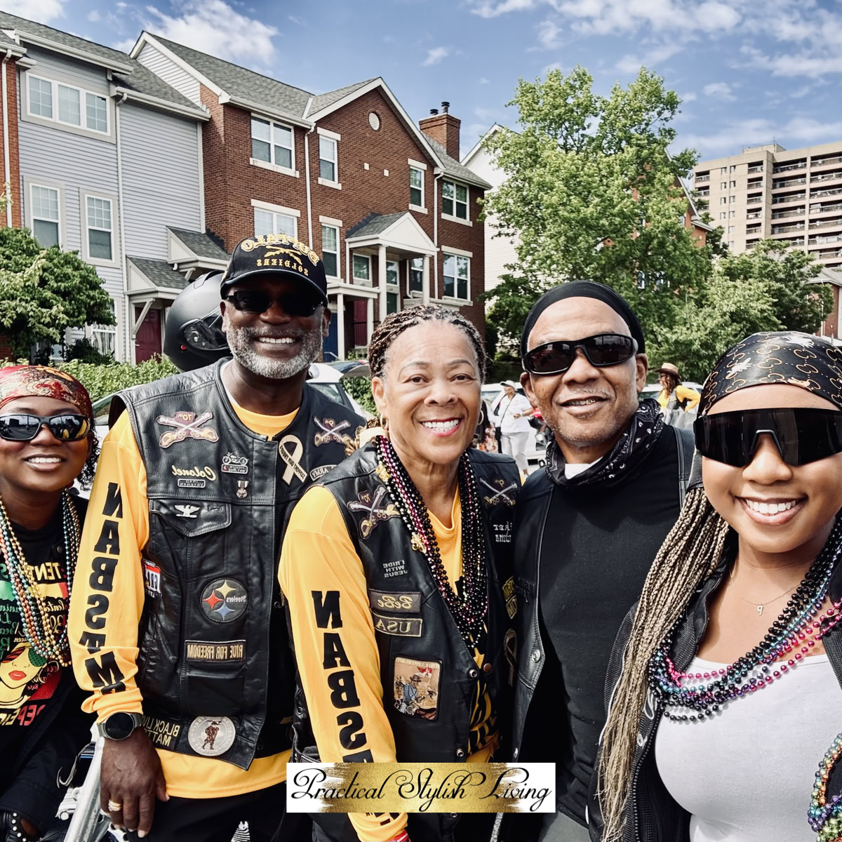 Juneteenth Pittsburgh PA This image captures a vibrant group from the National Association of Buffalo Soldiers & Troopers Motorcycle Club (NABSTMC) posing together outdoors.