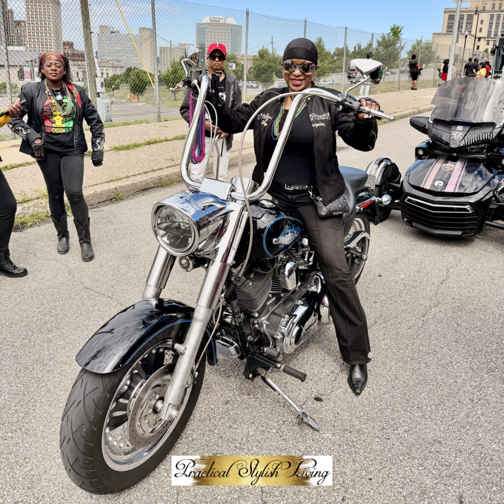 checking out a custom motorcycle in the staging area before the Pittsburgh Juneteenth parade kicks off.