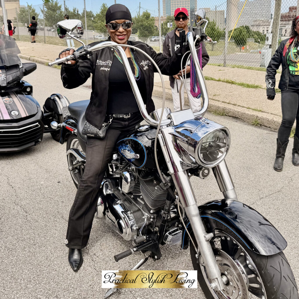 checking out a custom motorcycle in the staging area before the Pittsburgh Juneteenth parade kicks off.